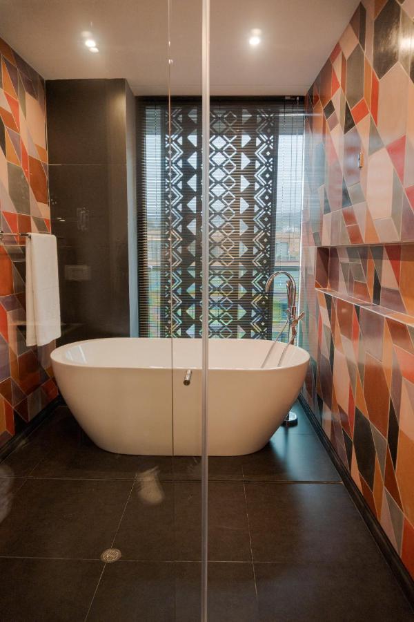 Hotel V1501 Pasto Kültér fotó A freestanding bathtub
