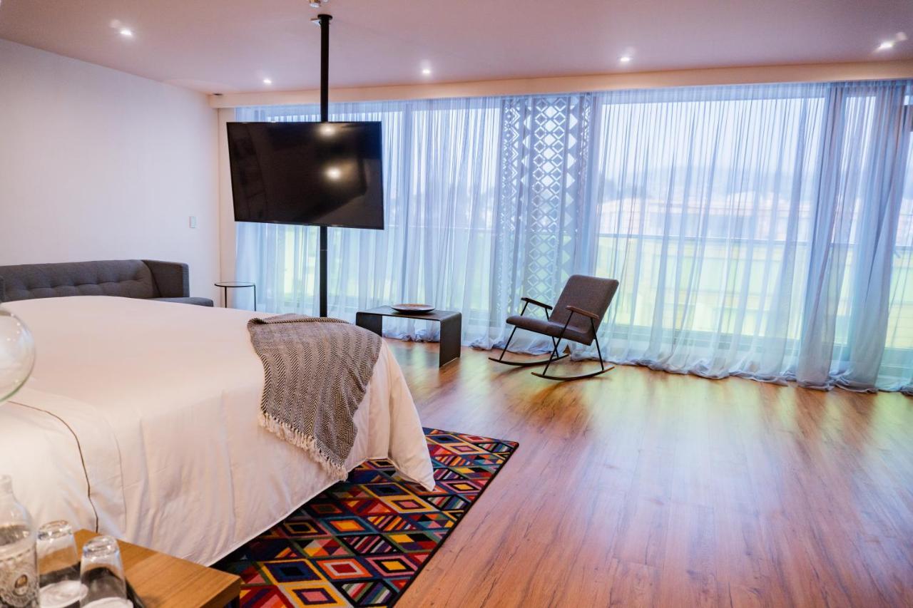 Hotel V1501 Pasto Kültér fotó A bedroom at the hotel