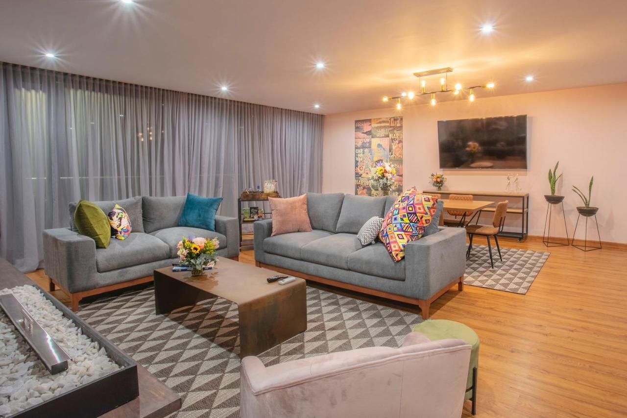 Hotel V1501 Pasto Kültér fotó The living room of the 2019 series