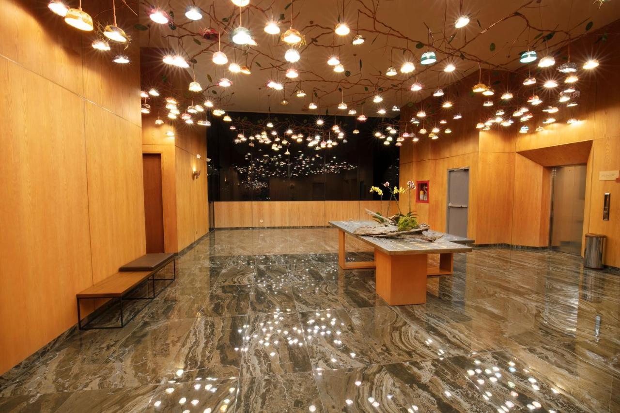 Hotel V1501 Pasto Kültér fotó The lobby of the National Museum of Singapore