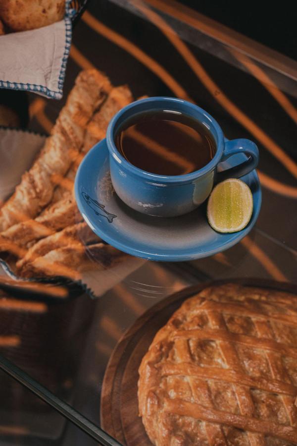 Hotel V1501 Pasto Kültér fotó A cup of coffee with a slice of lime